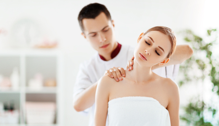 a beautiful girl enjoys massage and spa treatments
の写真素材