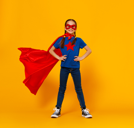 the concept of child superhero costume on yellow background&#xA;の写真素材