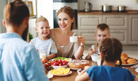 family mother father and children have Breakfast in the kitchen in morningの写真素材