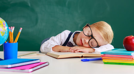 the child   boy student tired, asleep about school blackboard