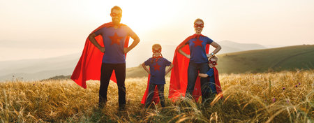concept of super family, family of superheroes at sunset in nature