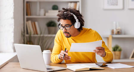 African American man working on remote projectの写真素材