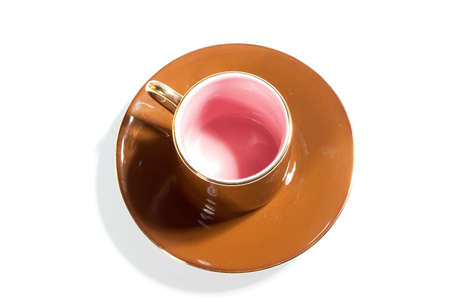Empty single coffee cup on saucer on white paper background with copyspaceの写真素材