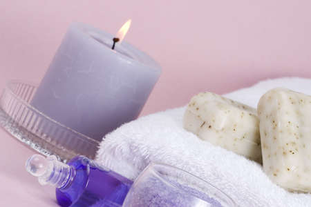 Spa set over pink paper background best suited for relaxing and health commercialsの写真素材