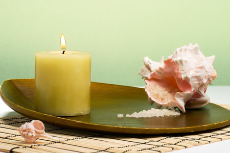 Aroma therapy with candle and seashells, suited for spa and healthy lifestyle usage. の写真素材
