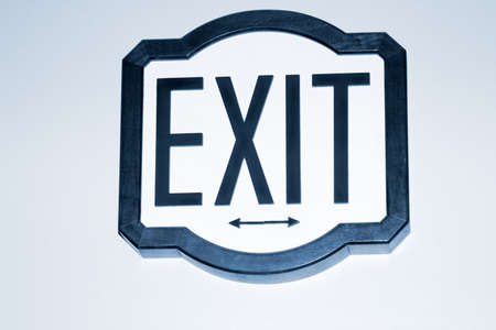 Exit sign on wallの写真素材