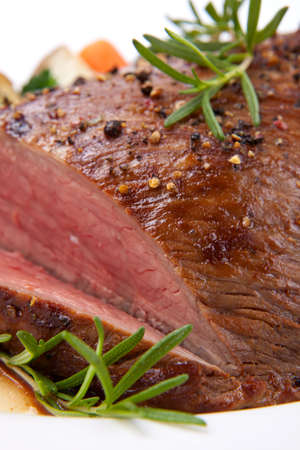 Roasted beef loin tri-tip with ground pepperの写真素材