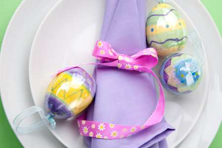 Closeup of Easter table setting with easter eggs