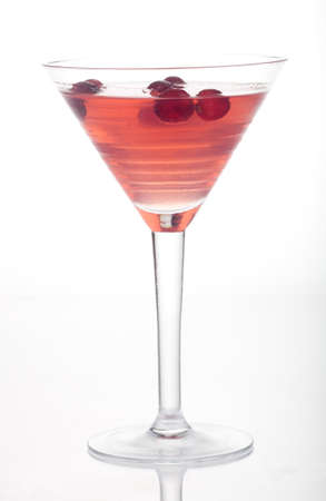 Close up of glass of Limomcello Cosmo Cocktail over white. Most popular cocktails series.の写真素材