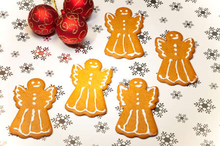 Closeup of Angels Gingerbread cookies, and Christmas ornamentの写真素材
