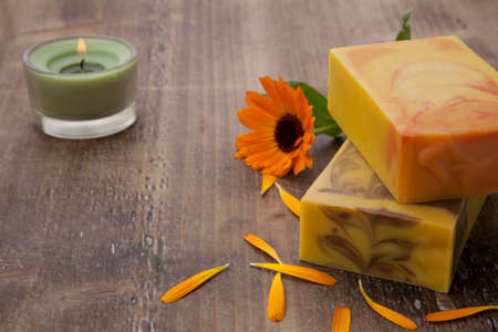 Spa set - handmade organic soap and fresh calendula. Best suited for relaxing and health commercials.の写真素材