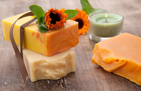 Spa set - handmade organic soap and fresh calendula. Best suited for relaxing and health commercials.の写真素材