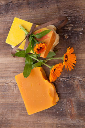 Spa set - handmade organic soap and fresh calendula. Best suited for relaxing and health commercials.の写真素材