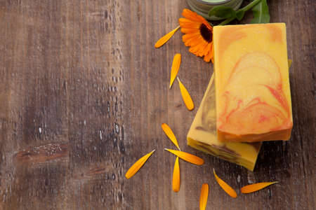 Spa set - handmade organic soap and fresh calendula. Best suited for relaxing and health commercials.の写真素材