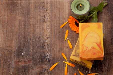 Spa set - handmade organic soap and fresh calendula. Best suited for relaxing and health commercials.の写真素材