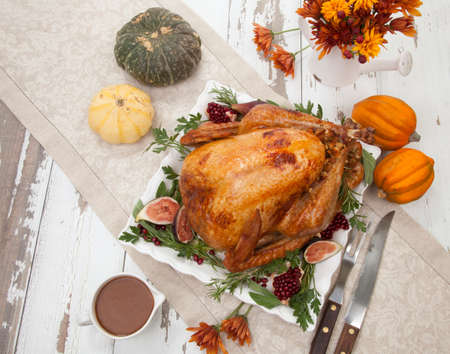 Garnished traditional roasted turkey for Thanksgivingの写真素材