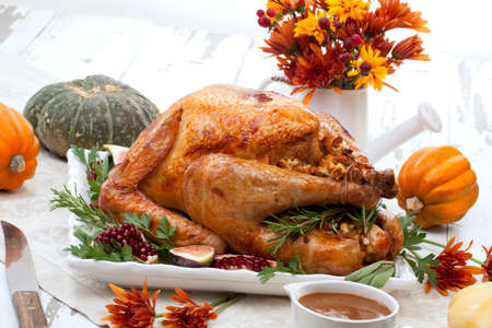 Garnished traditional roasted turkey for Thanksgivingの写真素材