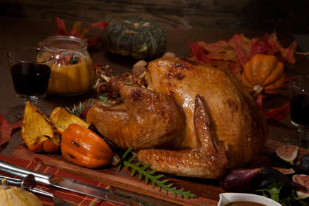 Garnished traditional roasted turkey for Thanksgivingの写真素材