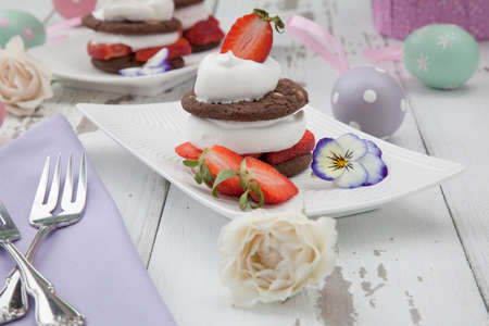 Easter theme deserts - strawberry chocolate Napoleons served with fresh strawberries.の写真素材