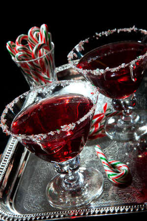 Closeup of Christmas vanilla mint martini with candy canes. Holiday cocktails series.の写真素材