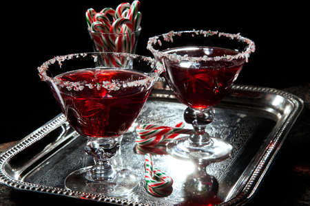 Closeup of Christmas vanilla mint martini with candy canes. Holiday cocktails series.の写真素材