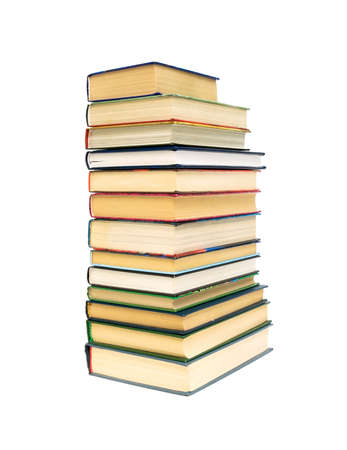 a large stack of different books isolated on a white backgroundの写真素材