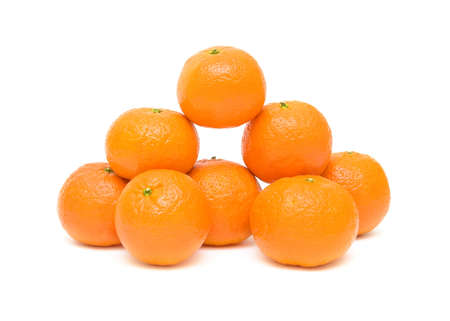 eight ripe mandarins closeup isolated on white backgroundの写真素材