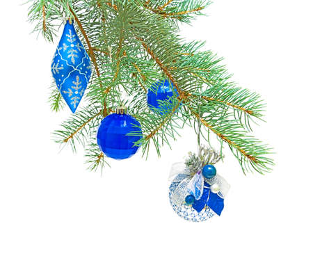 New Year's toys on the branches of spruce on a white backgroundの写真素材