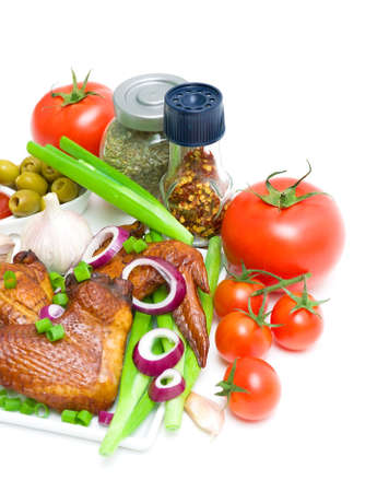 fresh vegetables, spices and smoked chicken wings on a white backgroundの写真素材