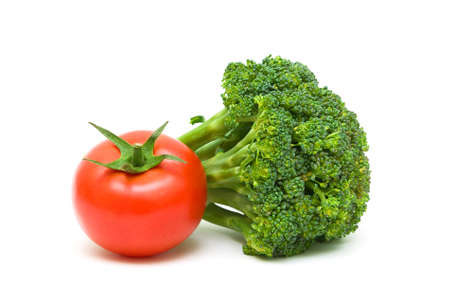 ripe tomato and fresh broccoli の写真素材