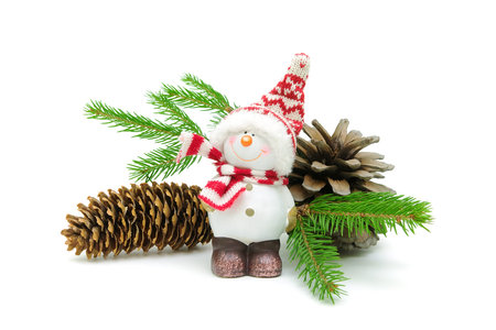 Snowman, cones and spruce branches isolated on white background.の写真素材