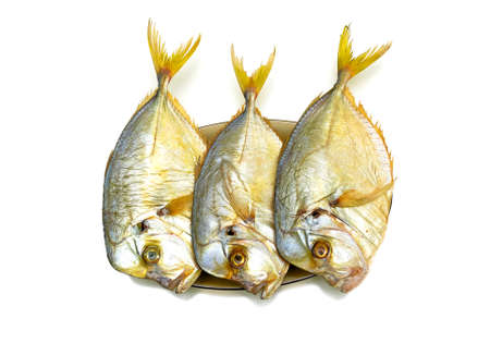 smoked Vomer on a plate isolated on a white background. の写真素材