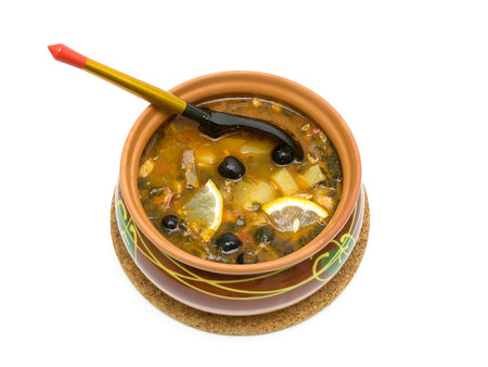 Hodgepodge soup in ceramic bowl isolated on white background. horizontal photo.の写真素材