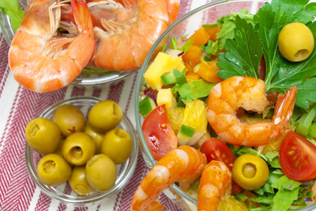 vegetable salad, shrimp and olives. horizontal photo.の写真素材