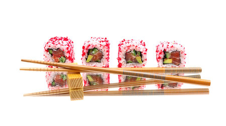 Japanese rolls and chopsticks on mirror surface. white background - horizontal photo.の写真素材