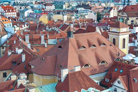 top view of houses with traditional red roofs in Prague (Czech Republic). horizontal photo.のeditorial素材