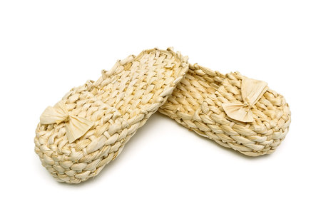 Russian bast shoes isolated on white background close-up. horizontal photo.の写真素材