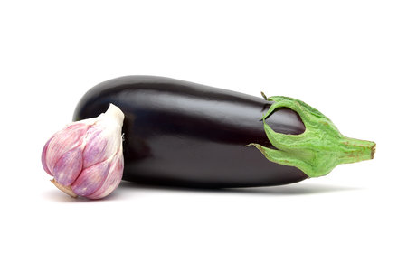 garlic and eggplant close up on a white background. Horizontal photo.の写真素材