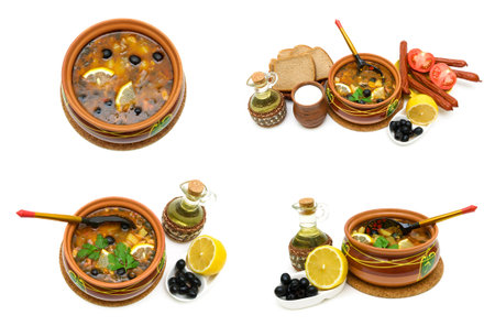 Dish of russian hodgepodge soup in ceramic pot and other foodstuffs on white background. horizontal...