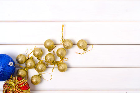 Christmas decorations on a white wooden backgroundの写真素材