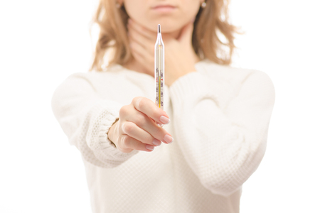 Woman throat thermometer medicine on white background isolationの写真素材