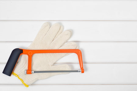 Tools laid out on a white wooden background