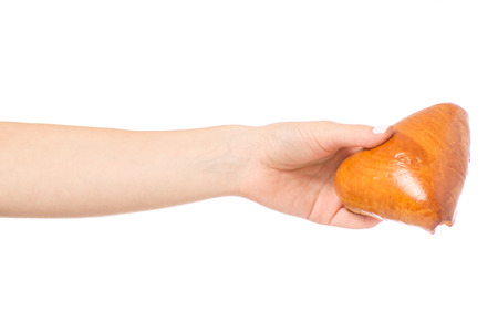 Female hands patty with cabbage on white background isolationの写真素材