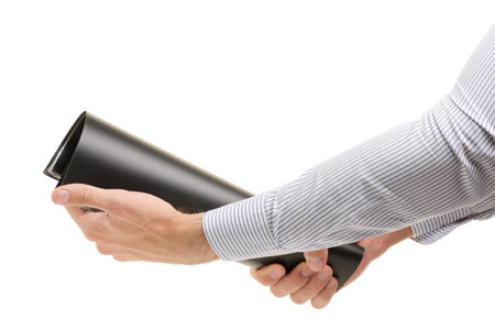 Male hands with a black folder on white background isolation