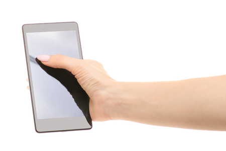 Smartphone in female hands on white background isolationの写真素材