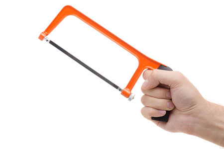 Fret saw in a hand on white background isolationの写真素材