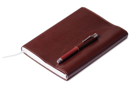 White and red diary on white background isolationの写真素材