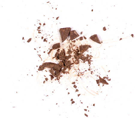 Pile chopped, milled chocolate isolated on white background, top viewの写真素材