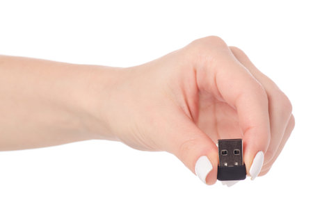 usb adapter in hand on white background isolation