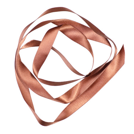 Ribbon brown gold on a white background isolation, top viewの写真素材